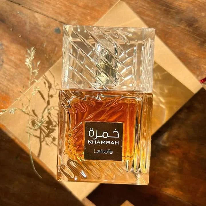 Lattafa Intense Oud Khamrah Eau de Parfum and Deodorant Spray in a value pack, featuring 100ml perfume and 200ml deodorant sprays.