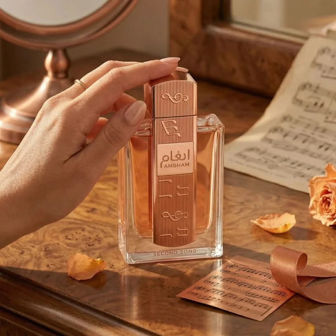 Lattafa Angham Second Song Eau De Parfum spray 100ml with elegant bottle design, showcasing the fragrance's luxurious appeal.