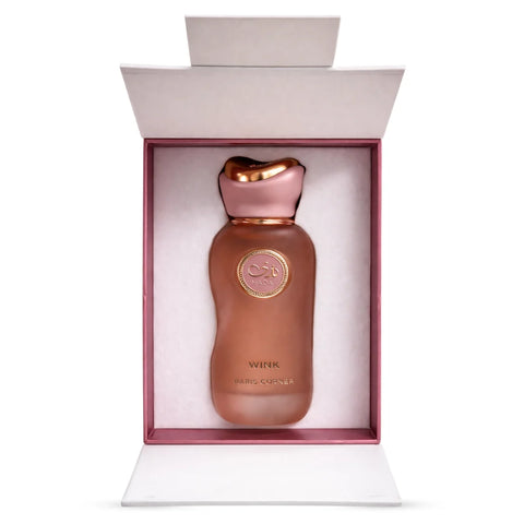 Nada Wink Eau De Parfum spray by Paris Corner, 100ml bottle, elegant floral fragrance with a sleek design.