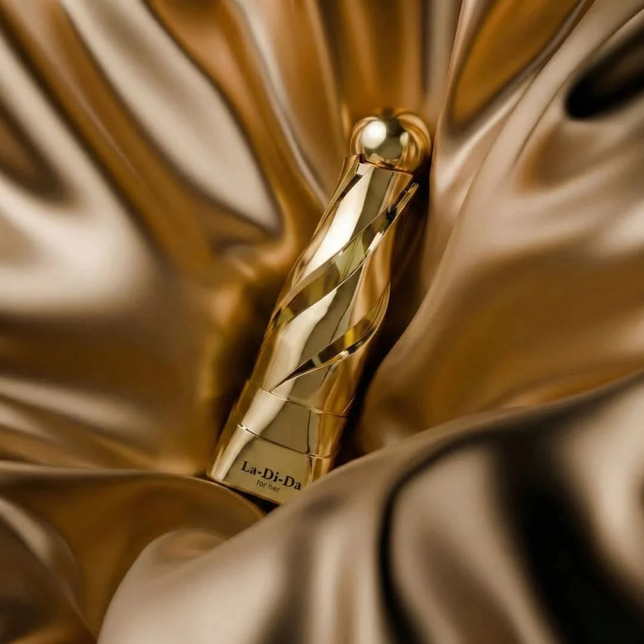 Arabiyat Prestige La-Di-Da Eau de Parfum spray 100ml bottle, elegant design, showcasing the Arabiyat brand and perfume packaging.