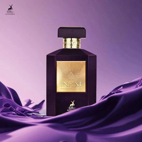 Maison Alhambra Infini Intoxicating Cherry Eau de Parfum spray 100ml in velvet pouch, featuring a sleek glass bottle with cherry fragrance