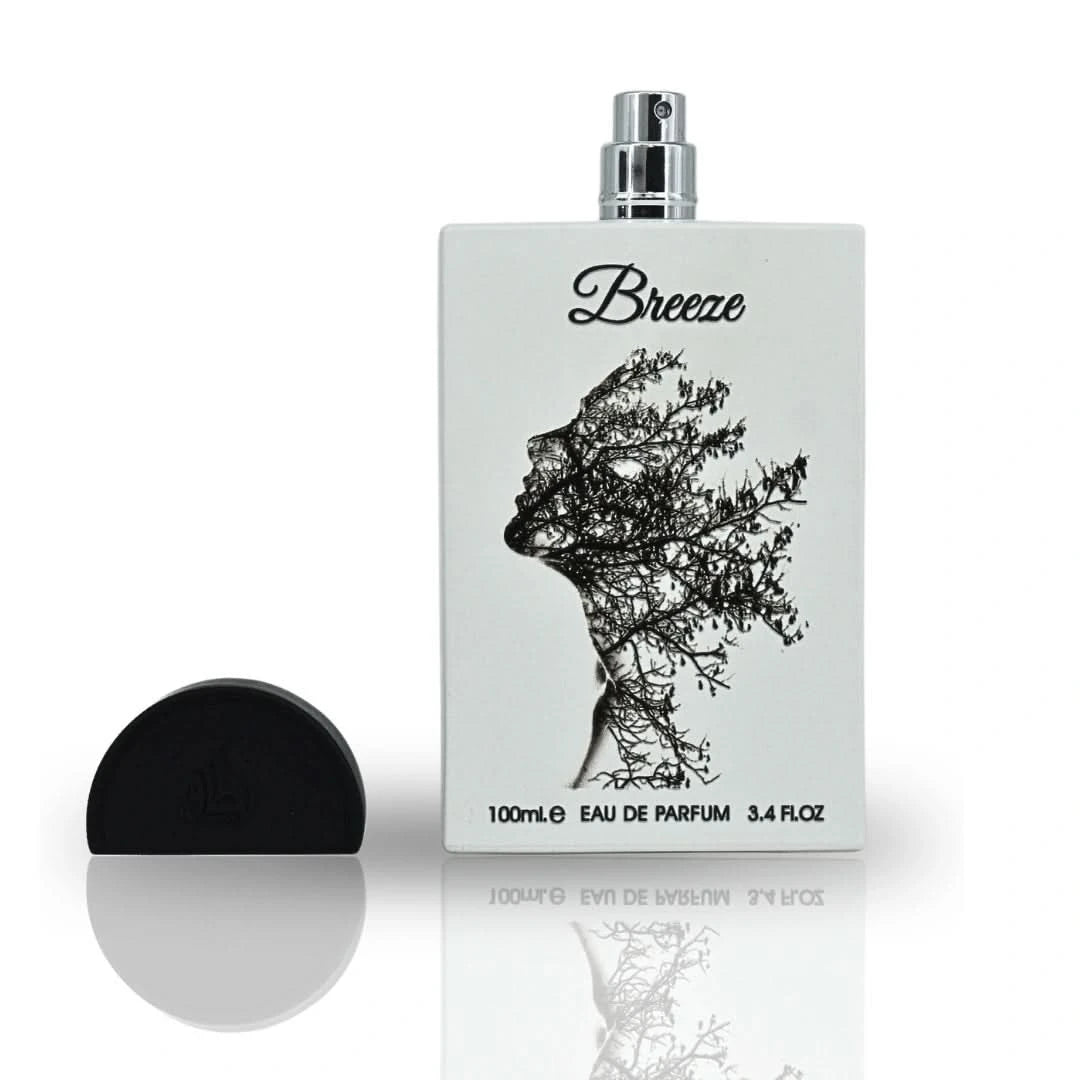 Lattafa Pride Breeze Eau De Parfum spray 100ml in velvet pouch, elegant bottle with floral and citrus notes.