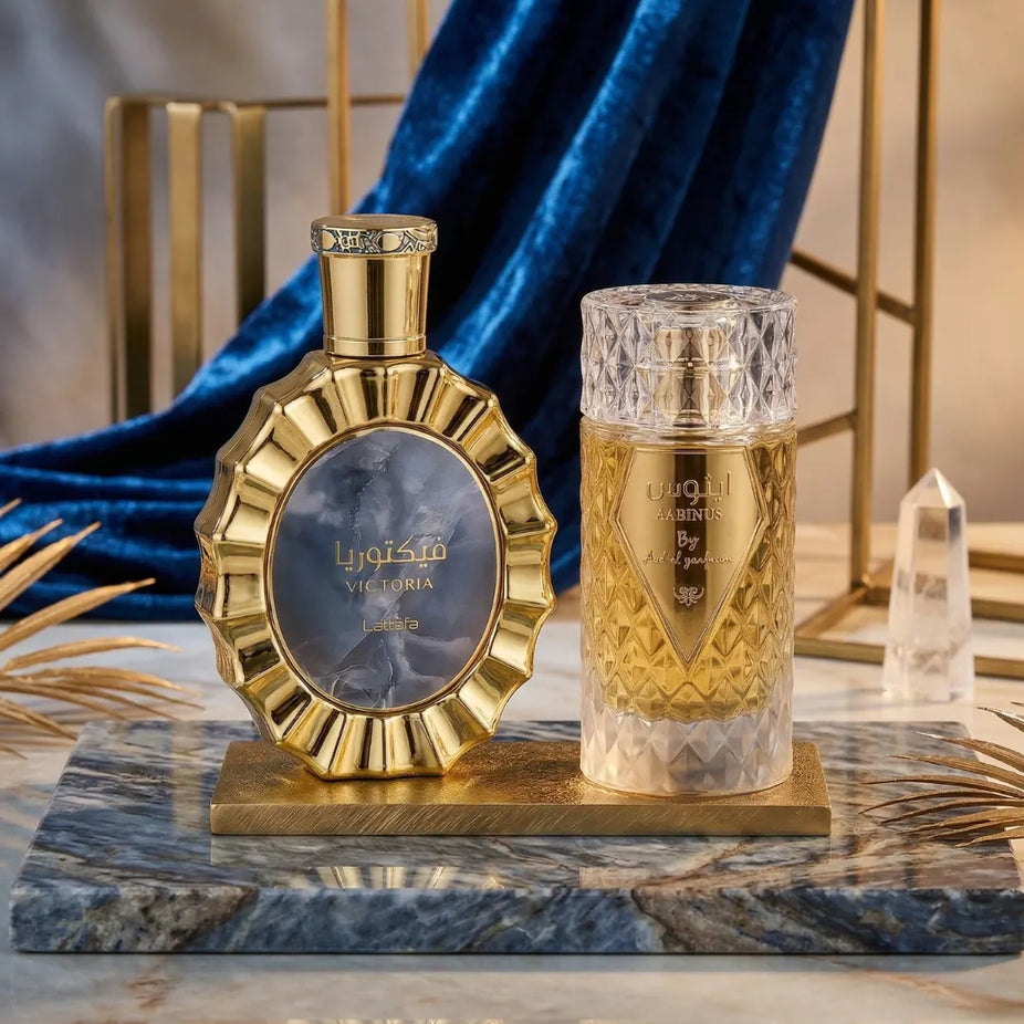Victoria and Aabinus Eau de Parfum Spray bundle featuring 100ml bottles by Lattafa and Ard Al Zaafaran, showcasing elegant perfume packaging.