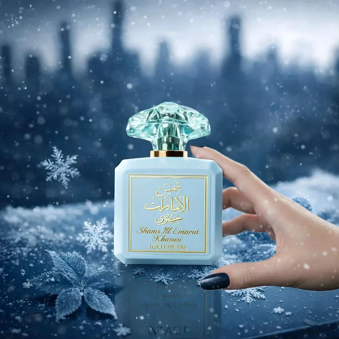 Three bottles of Ard Al Zaafaran Shams Al Emarat Khususi Iced Petal Eau De Parfum sprays, 100ml each, displayed in a pack