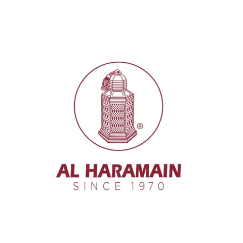 Al Haramain Amber Oud Aqua Dubai EDP spray in a 100ml bottle, displayed with a velvet pouch, showcasing luxurious fragrance packaging.