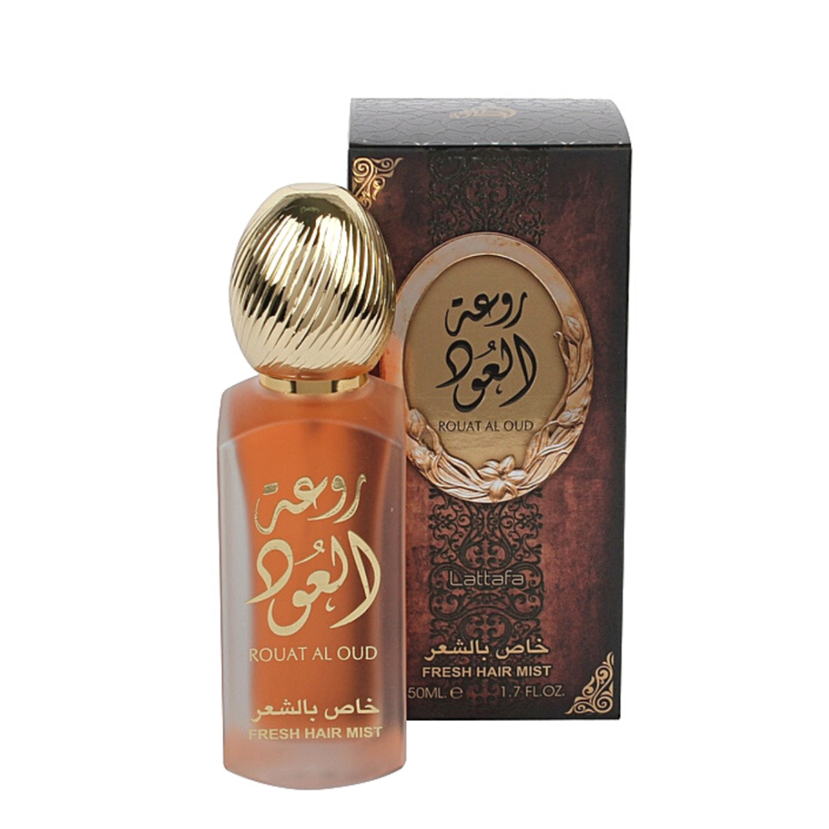 Lattafa Rouat Al Oud Hair Mist 50ml spray bottle with elegant packaging, featuring floral and oud fragrance elements.