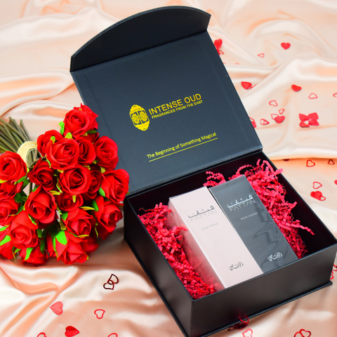 Rasasi Fattan perfume gift set with 50ml Eau de Parfum bottles for men and women, presented in a stylish box.