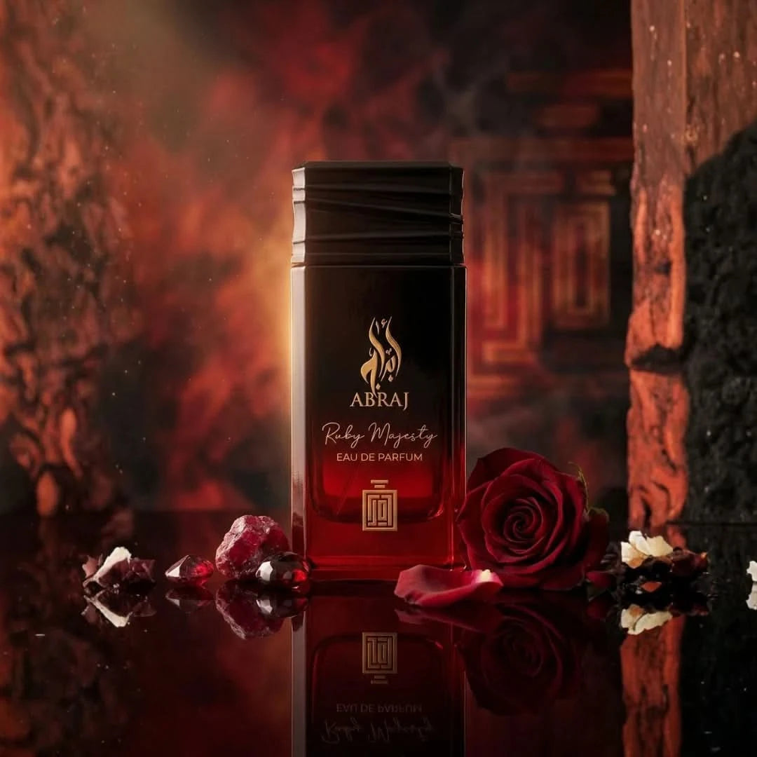 Aura Fragrances Abraj Ruby Majesty Eau De Parfum Spray 100ml bottle with elegant packaging and gold accents.