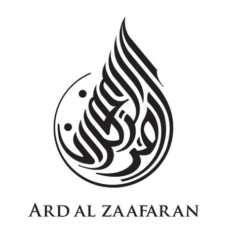 Fakhar Al Oud The White Oud EDP spray by Ard Al Zaafaran, 100ML, displayed in a velvet pouch with a sleek glass bottle.