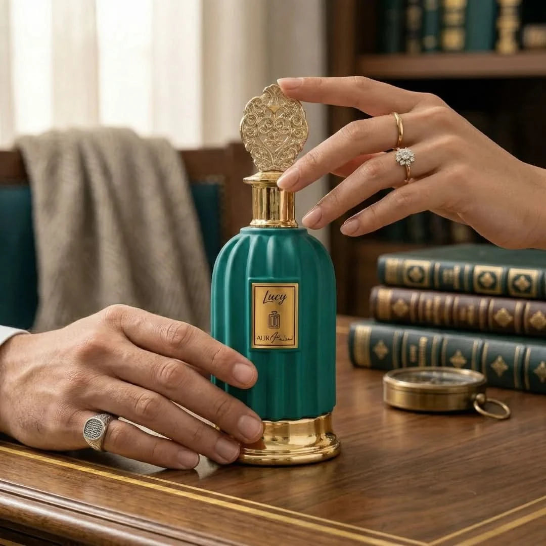 Aura Art Lucy Eau De Parfum spray by Aura Fragrances, 100ml bottle with elegant packaging and floral fragrance details.