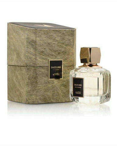Oud Elite Dazzling Gold Eau de Parfum 100 ml – gold bottle on a sleek surface