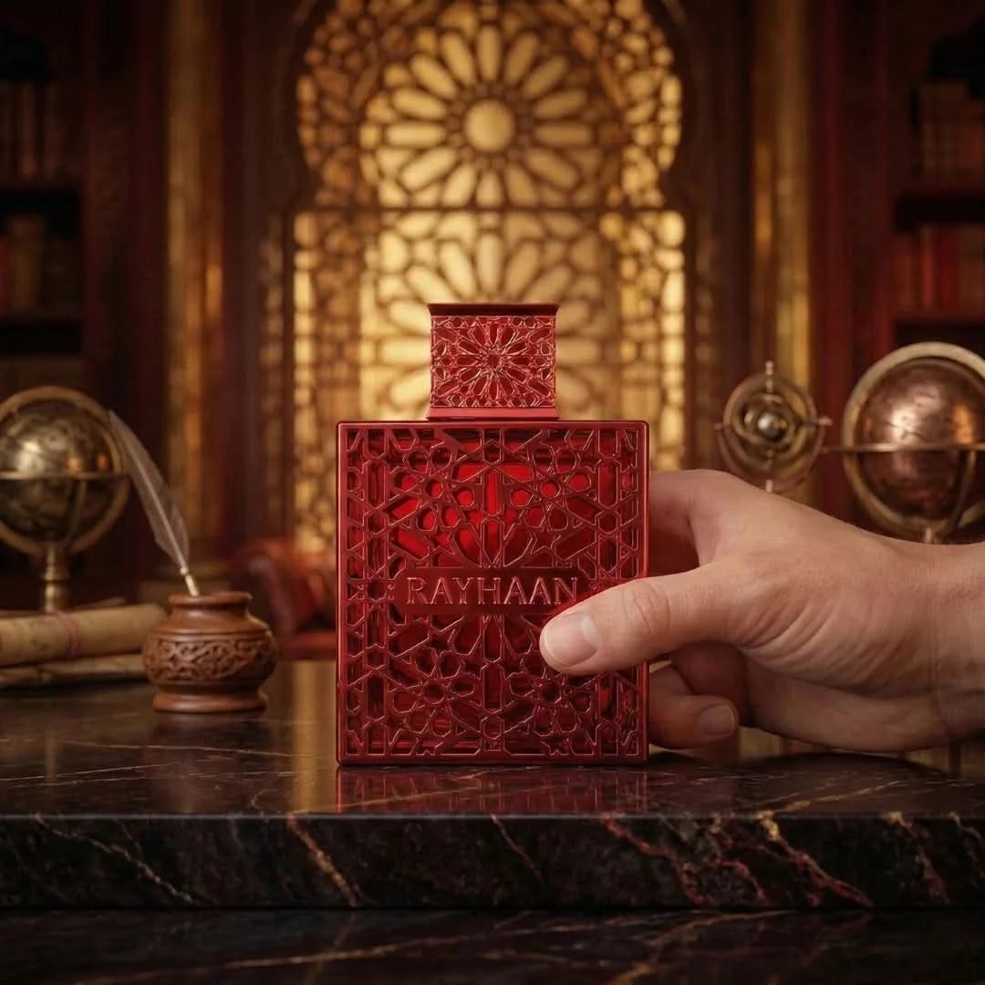 Rayhaan Crimson Eau de Parfum Spray 100ml, featuring a sleek bottle with a crimson-colored cap and elegant design.