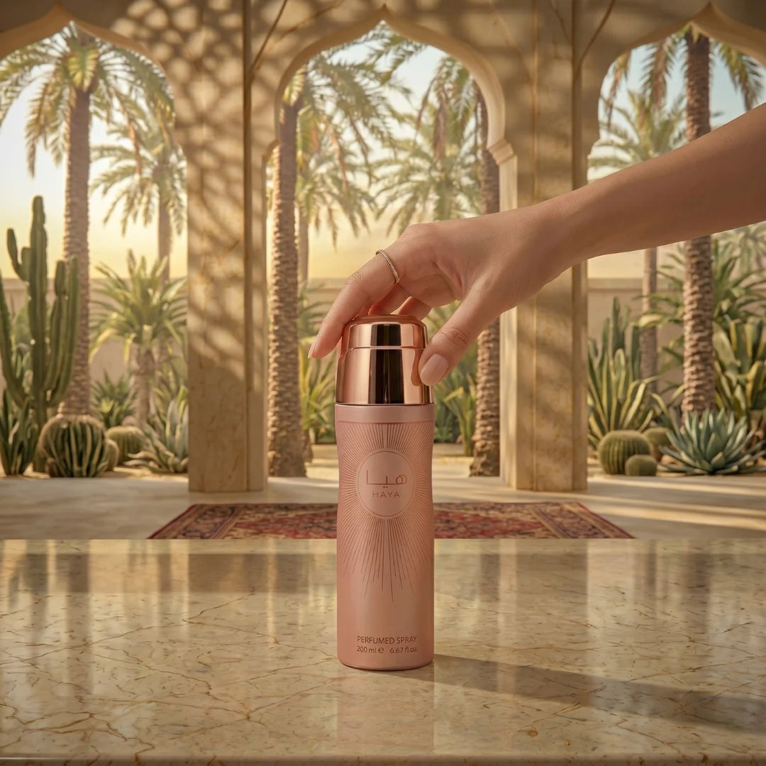 Lattafa Haya Body Spray 200ml deodorant bottle with a sleek design and floral accents, showcasing the refreshing fragrance.