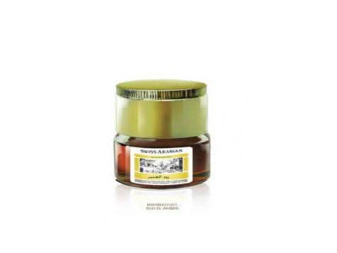 Swiss Arabian Ruh El Amber concentrated perfume oil in a 9ml bottle, showcasing elegant packaging and amber-colored oil inside.