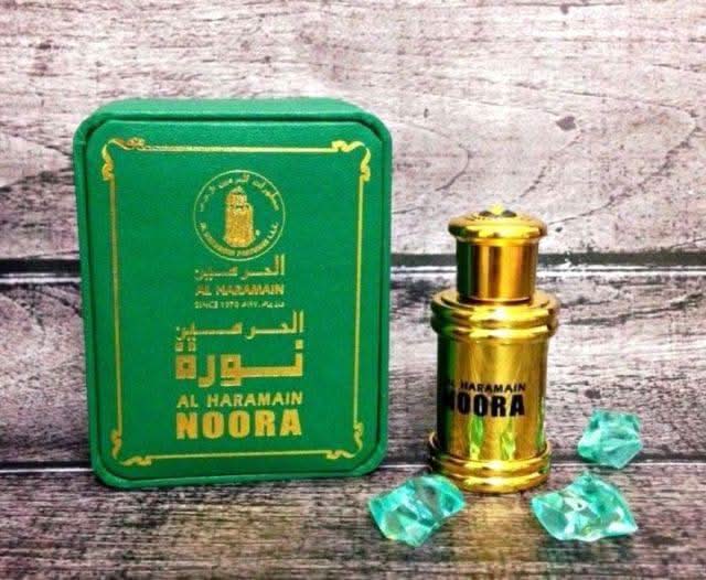 Noora Perfume Oil by Al Haramain in 12ml glass bottle, featuring a sleek design and elegant cap for concentrated fragrance.