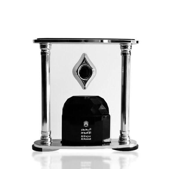 Al Hajar Al Aswad perfume oil by Abdul Samad Al Qurashi in 30ml bottle, showcasing elegant packaging and dark glass container.