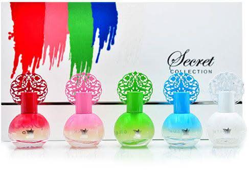Arabian Oud Secret Collection perfume gift set with multiple bottles and elegant packaging, showcasing luxurious fragrance options.