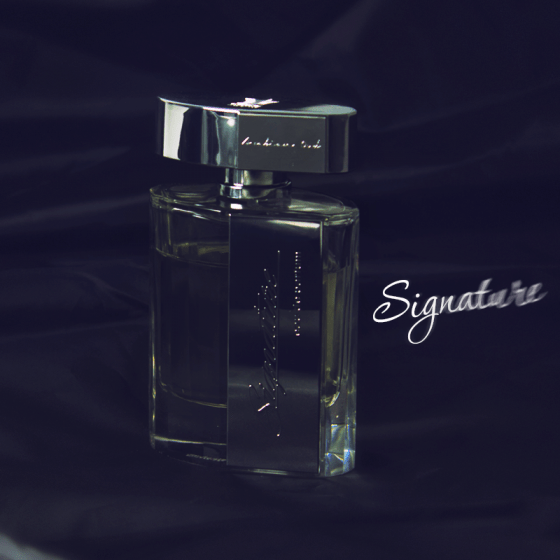 Arabian Oud Signature for Men EDP bottle, 90 ML (3 oz), elegant fragrance with sleek design and signature branding.