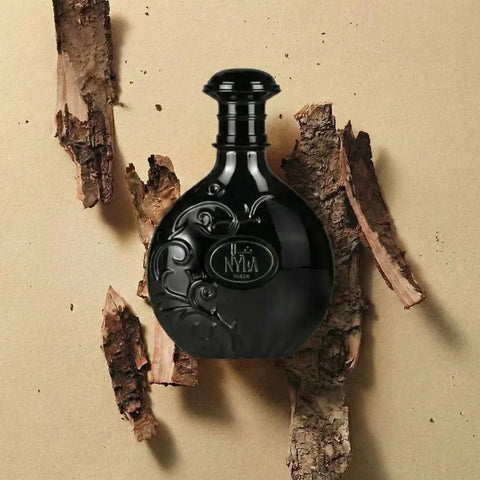 Arabiyat Prestige Nyla Suede Eau de Parfum spray 80ml, elegant bottle showcasing the luxurious fragrance.