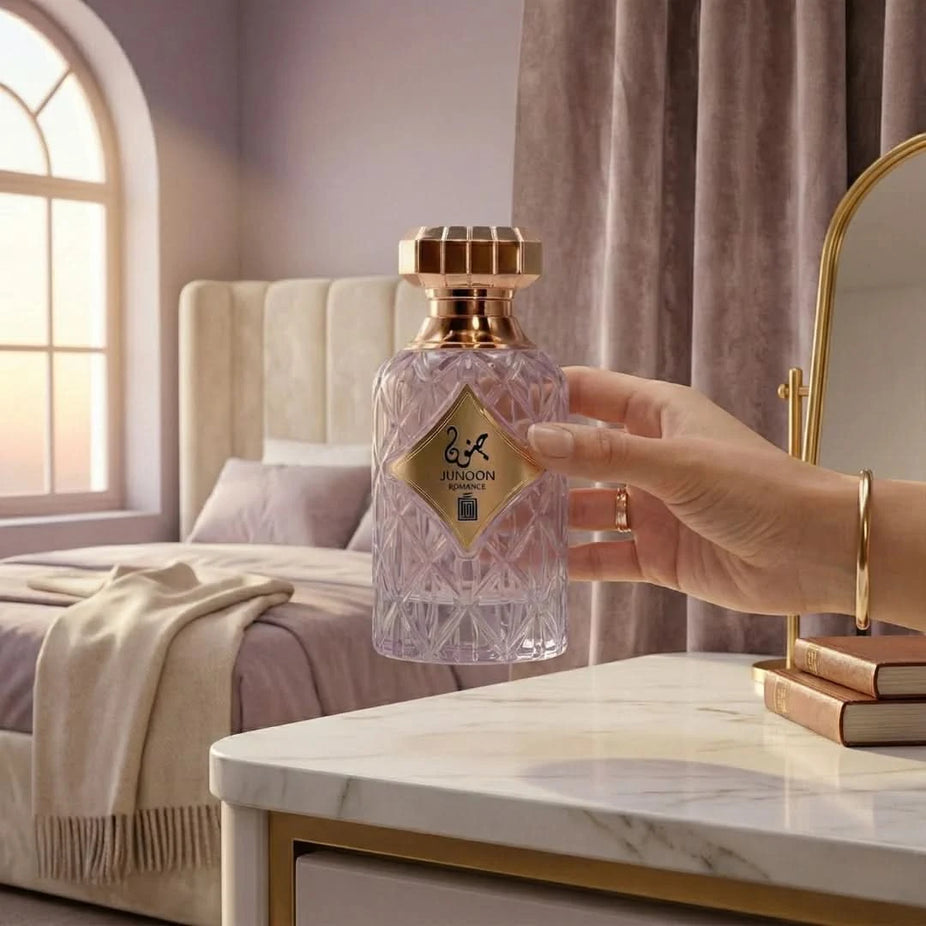 Aura by Aura Junoon Romance Eau De Parfum spray 100ml, elegant glass bottle with floral and oriental fragrance accents.