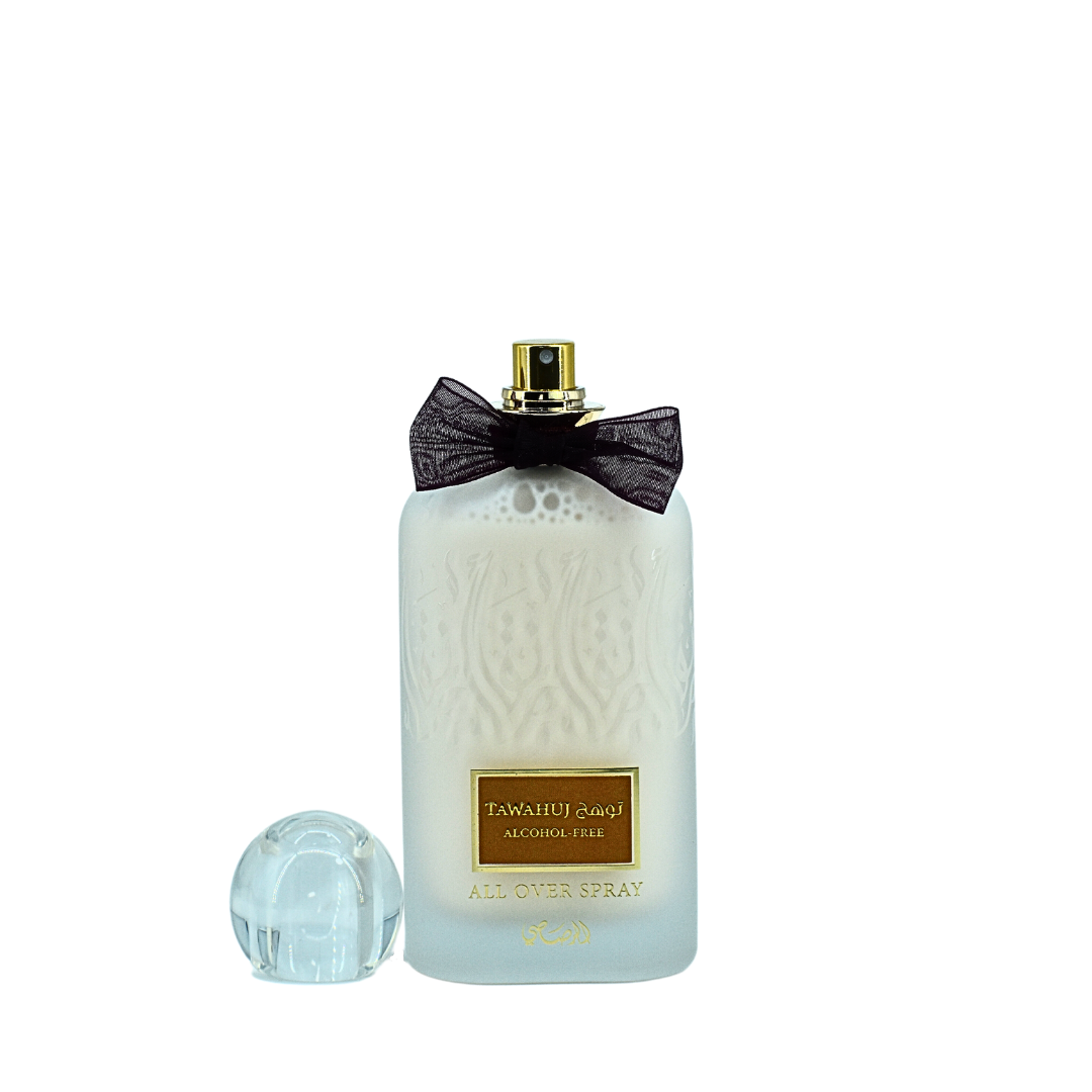 Rasasi Tawahuj All Over Spray Eau De Parfum 100ML with velvet pouch, alcohol-free fragrance bottle and elegant packaging.