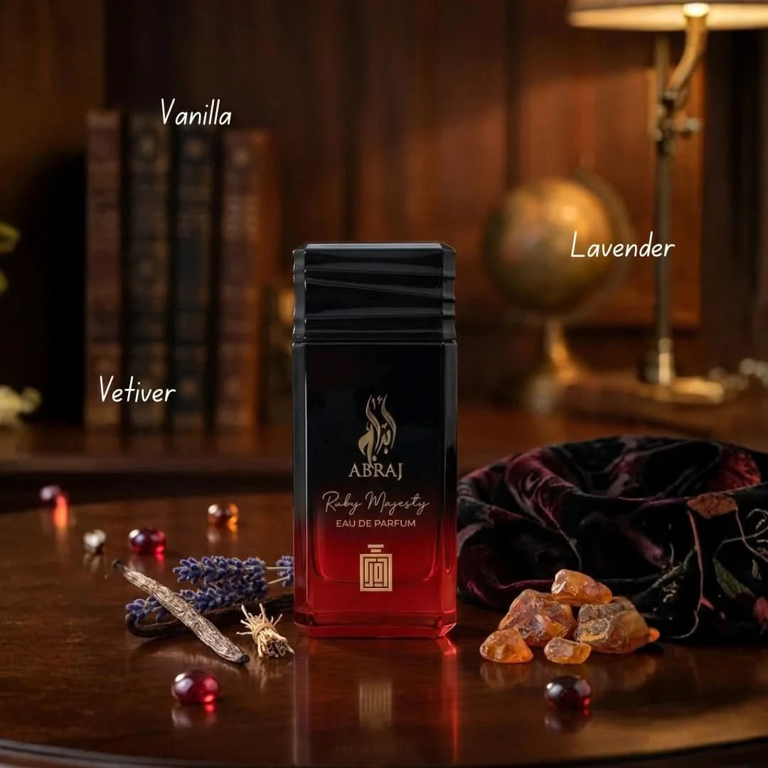 Aura Fragrances Abraj Ruby Majesty Eau De Parfum spray 100ml, elegant perfume bottle with intricate design.