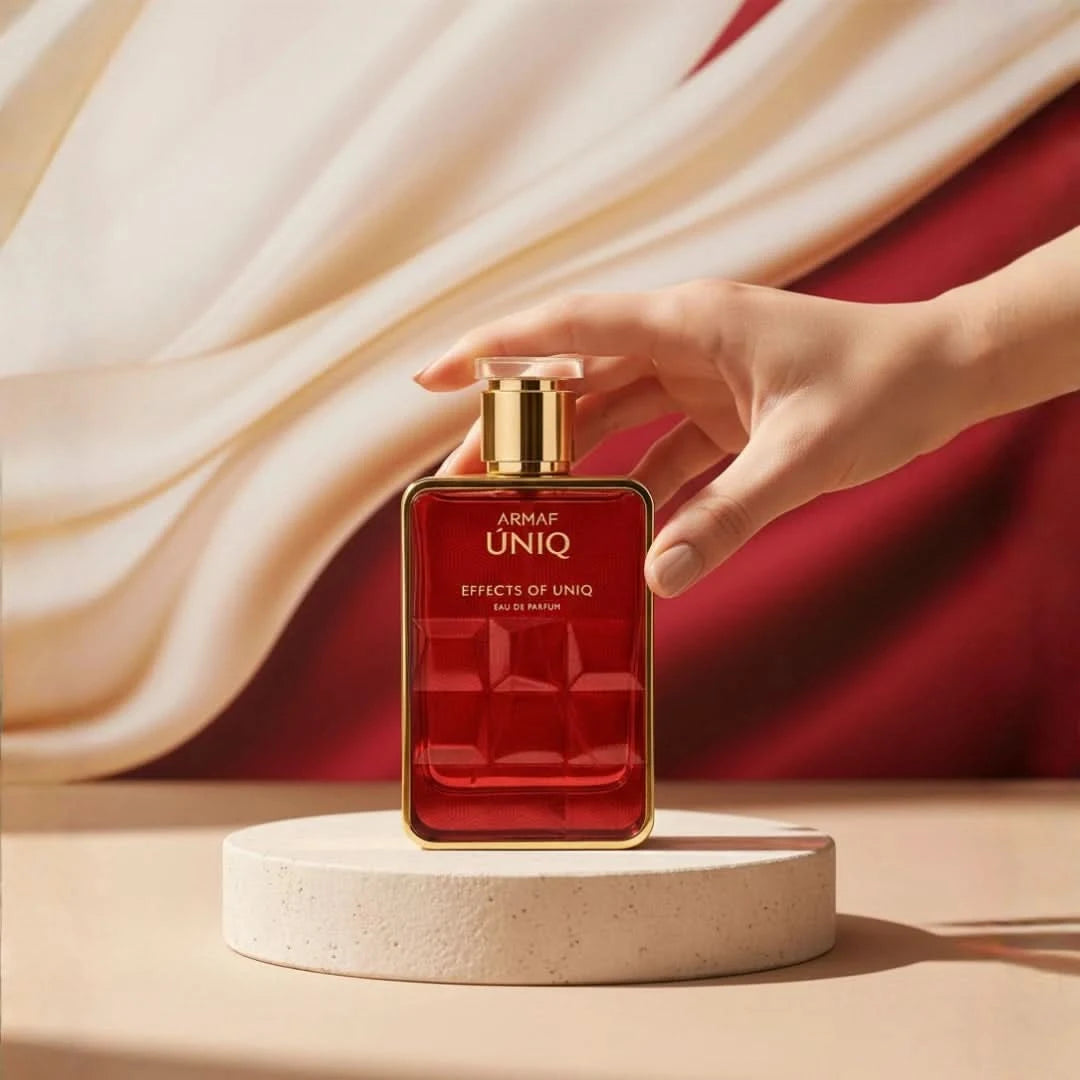 Armaf Uniq Eau De Parfum spray bottle, 100ml, with sleek design and elegant branding visible.