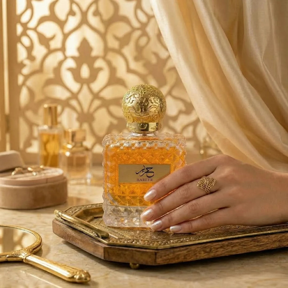 Hareer Eau De Parfum Spray by Aura, 100ml bottle, elegant glass container with a sleek design, showcasing the Aura brand.