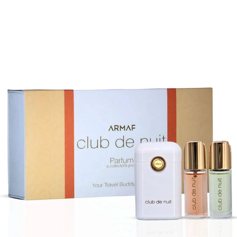 Armaf Club De Nuit Woman travel perfume set with 12ml bottles, featuring a stylish travel buddy case and fragrance bottles.