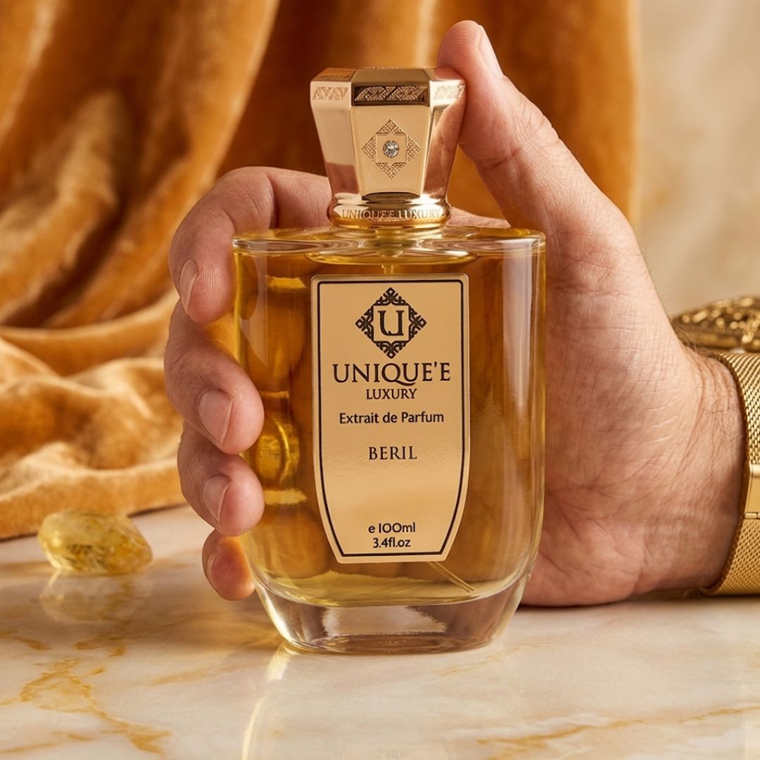 Unique'e Luxury Beril Extrait de Parfum spray 100ml bottle, elegant design, showcasing the luxurious fragrance packaging.