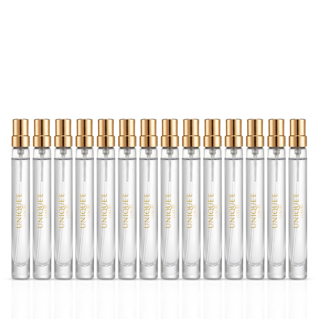 Unique'e Luxury Travel Discovery Set with 14 mini 11ml Eau de Parfum sprays, showcasing a variety of elegant scents.