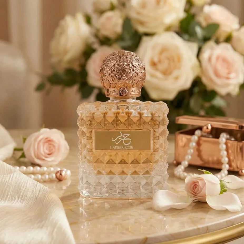 Aura by Aura Hareer Rose Eau De Parfum spray 100ml, featuring elegant rose scent in a sleek glass bottle.