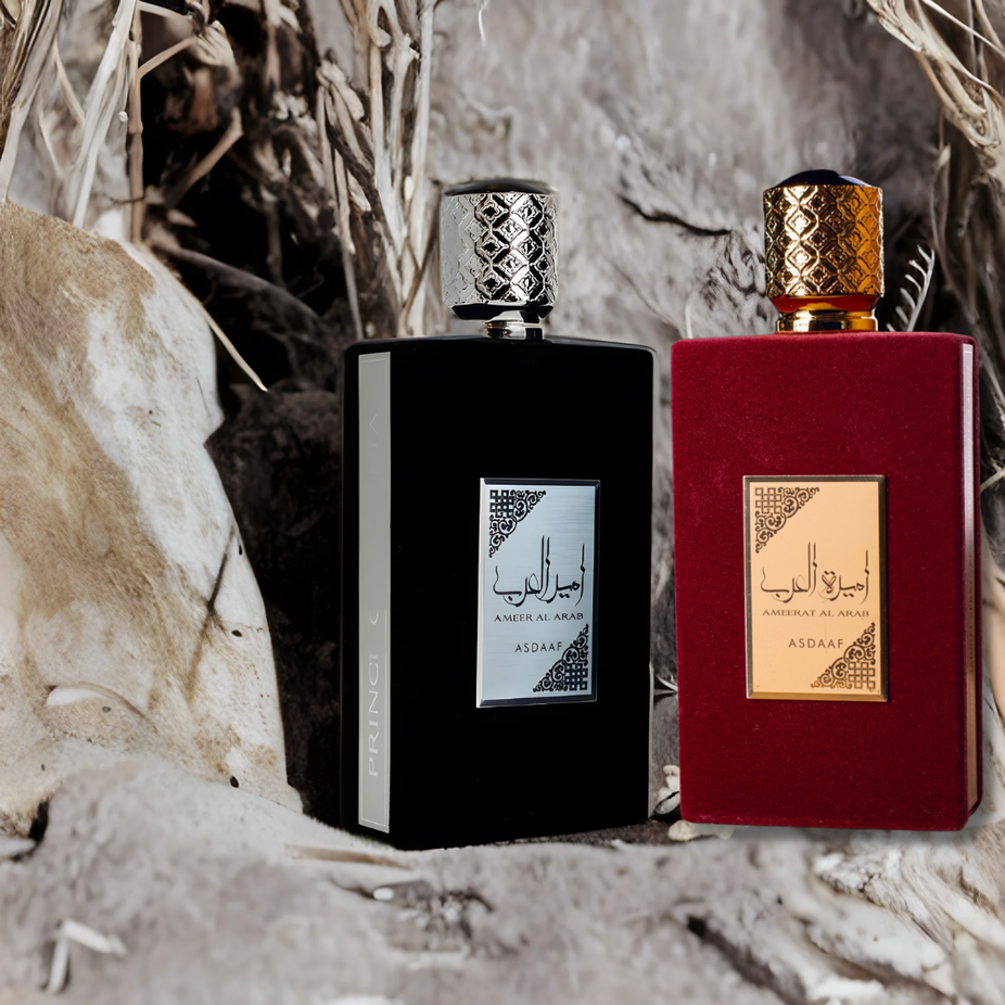 A bundle of Ameer Al Arab and Ameerat Al Arab 100ML EDP perfumes by Asdaaf, featuring elegant fragrance bottles with intricate designs.