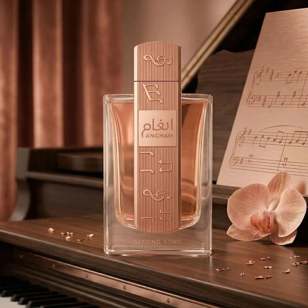 Lattafa Angham Second Song Eau De Parfum spray 100ml bottle with floral and musky scent, elegant design, and clear glass packaging.