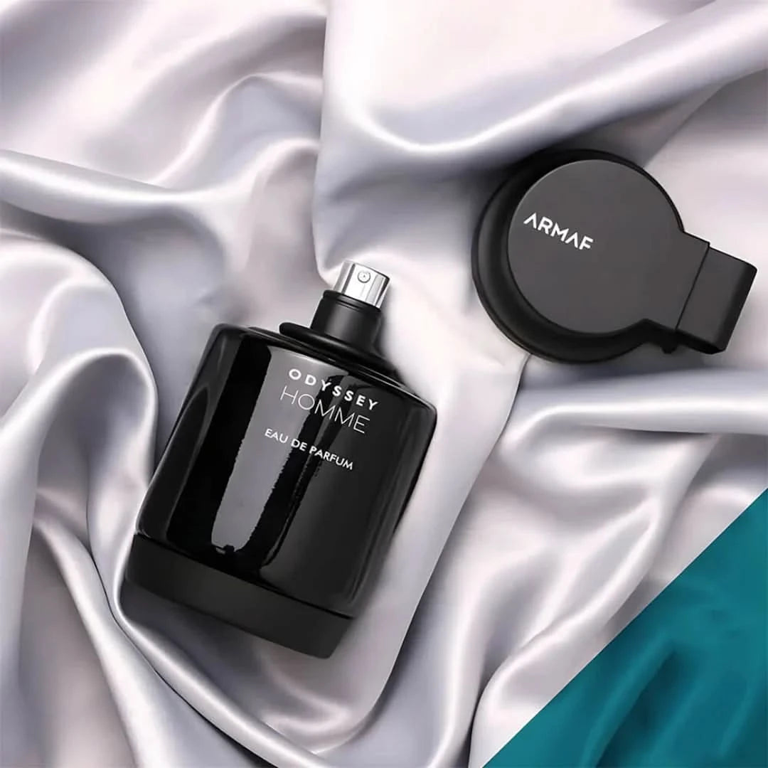 Odyssey Homme Black Eau de Parfum spray by Armaf, 100ml, featuring sleek black bottle and elegant design.