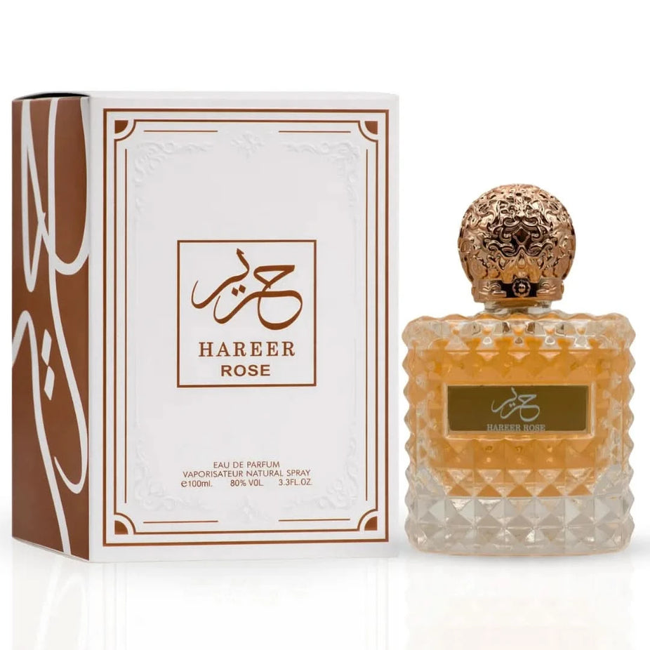 Aura by Aura Hareer Rose Eau De Parfum Spray 100ml, elegant floral fragrance with rose notes, in a sleek bottle.