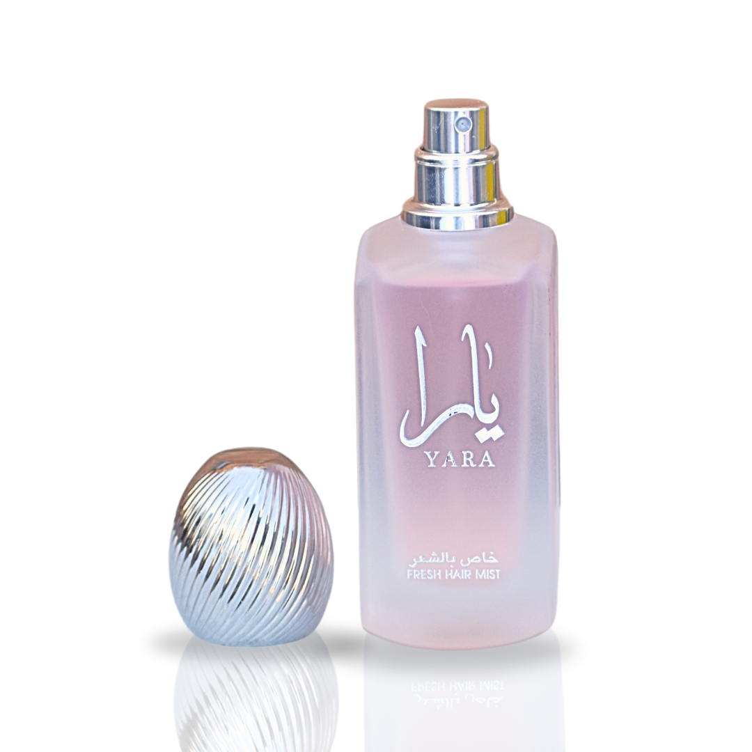 Lattafa Yara Fresh Hair Mist 50ml in a velvet pouch, featuring a spray bottle with a floral label and elegant packaging.