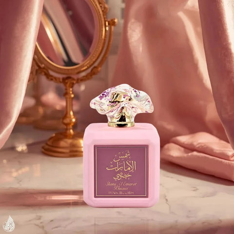 Bundle of Ard Al Zaafaran Shams Al Emarat Khususi Pink Blush Eau de Parfum sprays in 100ml bottles, featuring pink and glow-inspired designs.