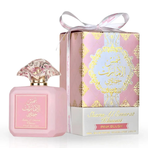 Ard Al Zaafaran Pink Blush Shams Al Emarat perfume bundle with 100ml spray, 50ml spray, and 10ml roll-on perfume oil.