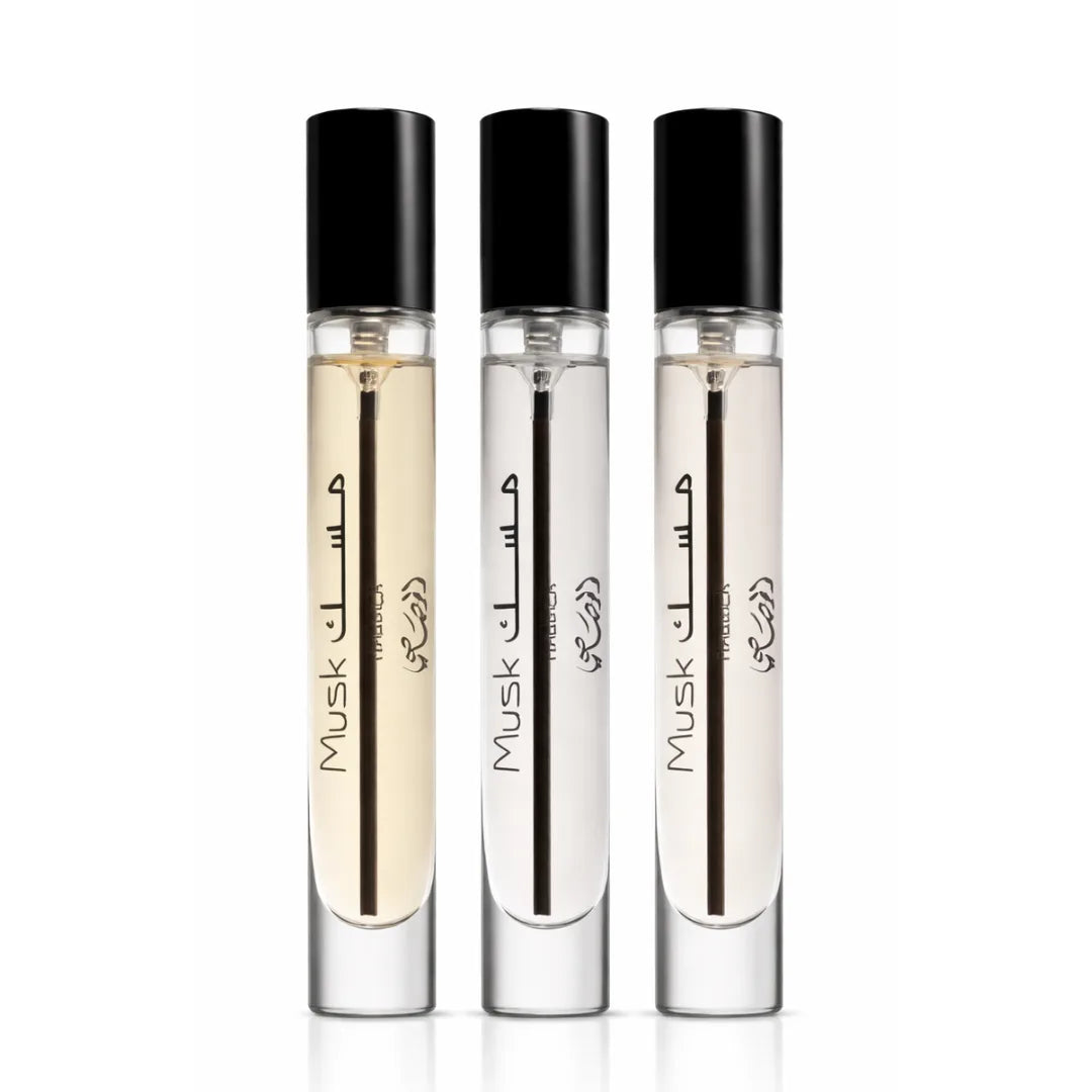 Rasasi Scent Odyssey Musk perfume gift set with three 7.5ML bottles in a velvet pouch, showcasing elegant fragrance packaging.
