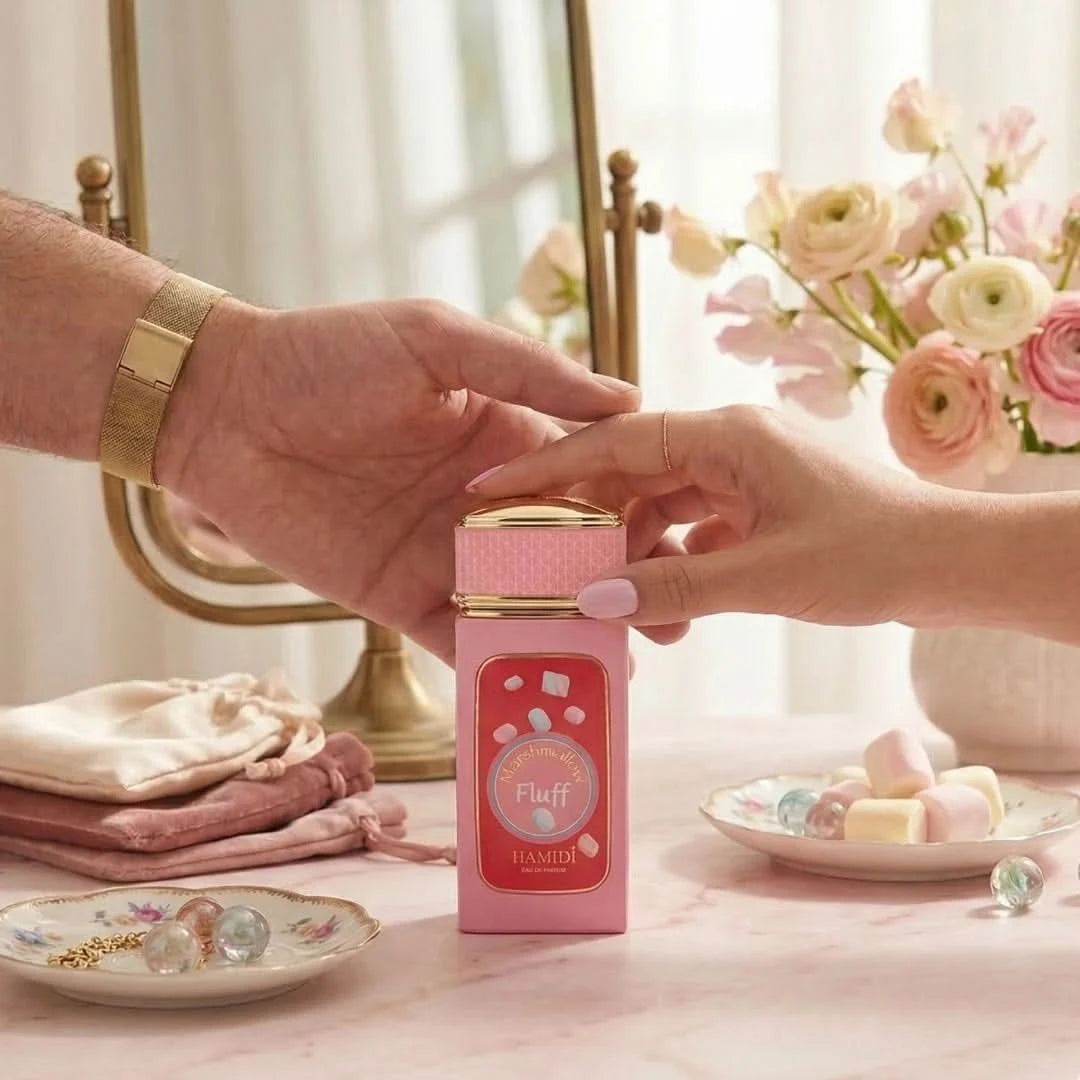 Hamidi Marshmallow Fluff Eau De Parfum spray 100ml with a sleek bottle, showcasing the soft, sweet fragrance inside.