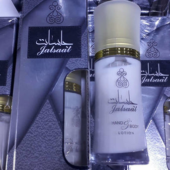 Ard Al Zaafaran Jalsaat Lotion 50GMS, creamy lotion in a clear bottle with purple and white label, close-up shot.