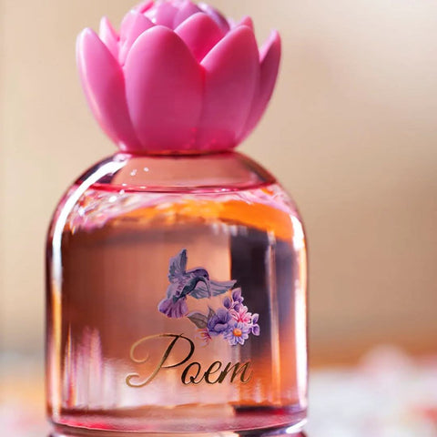 Ideas Poem Unisex Eau De Parfum 100mL bottle with elegant packaging and spray nozzle, showcasing the fragrance design.