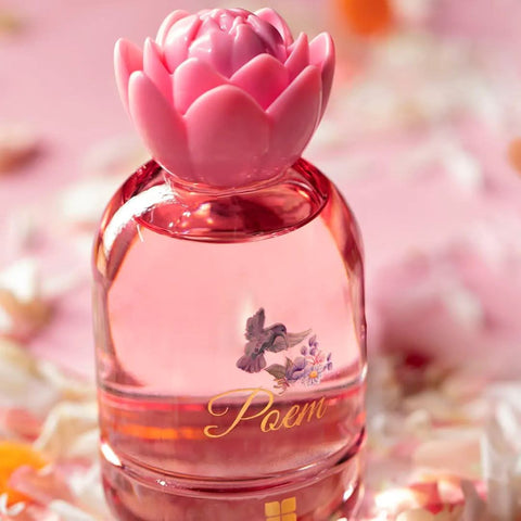 Ideas Poem Unisex Eau de Parfum 100mL bottle with elegant packaging, showcasing the fragrance's sophisticated design.