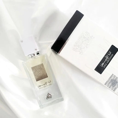 Lattafa Ana Abiyedh Eau de Parfum 60ML bottle with velvet pouch, featuring elegant fragrance packaging and design.