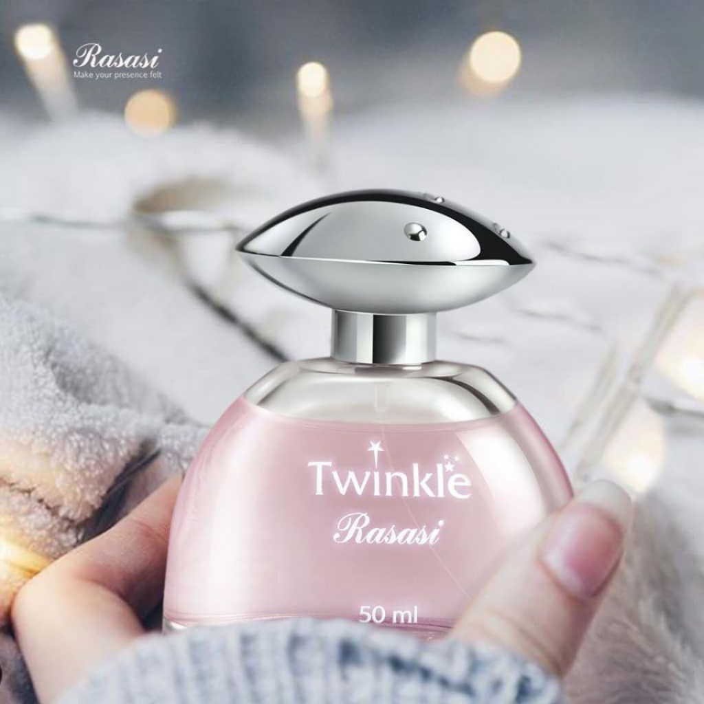 Rasasi Twinkle for Women EDP 50ML in a velvet pouch, featuring elegant perfume bottle and luxurious packaging.