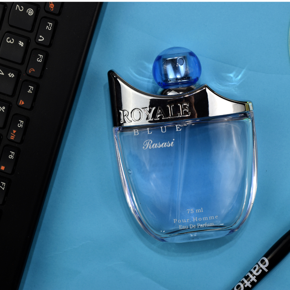 Rasasi Royale Blue for Men EDP 75ml in a velvet pouch, featuring sleek bottle design and elegant packaging.
