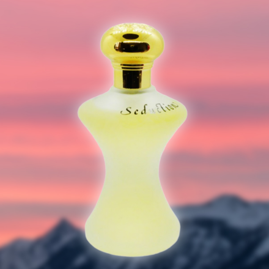 Rasasi Seduction for Women EDP 75ML in a velvet pouch, featuring elegant fragrance bottle with floral and fruity notes.