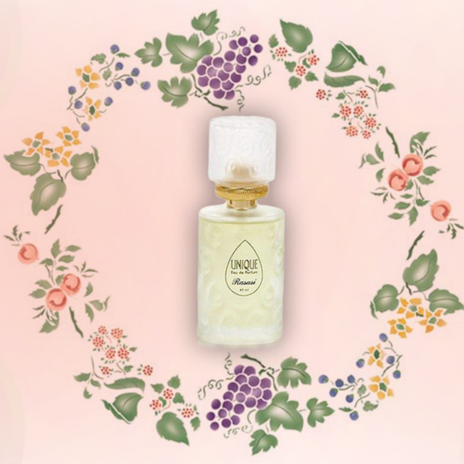 Rasasi Unique EDP perfume 45ML in a velvet pouch, showcasing the elegant bottle and luxurious packaging.