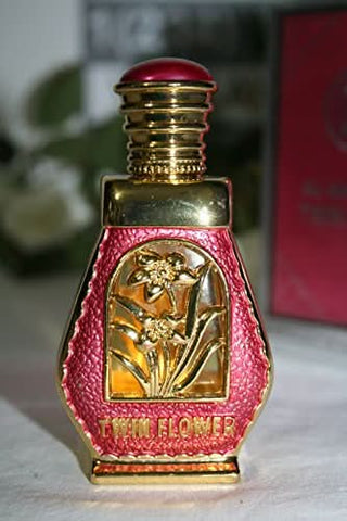 Al Haramain Twin Flower Perfume Oil 15ml with velvet pouch, showcasing the elegant glass bottle and floral label design.